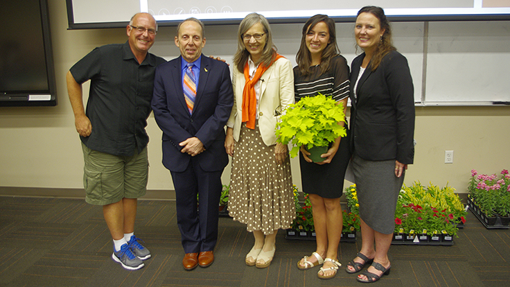 Professor gives student 40,000th plant