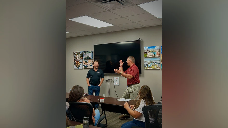 Brian DuMont, CEO of Yardnique & ASI Founder Joe Chiellini celebrating the deal