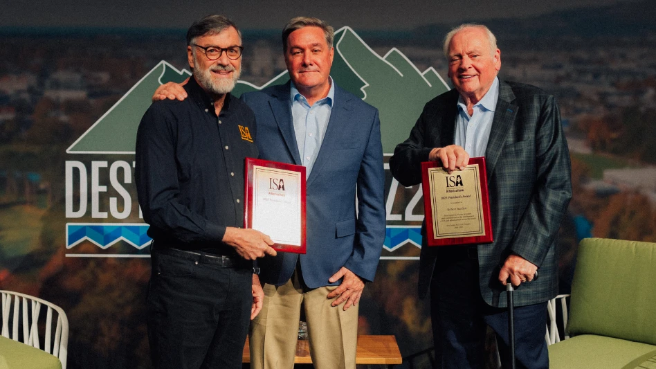 ISA board president Tom Smiley (left) stands with Bartlett's Jim Ingram and Robert Bartlett Jr.