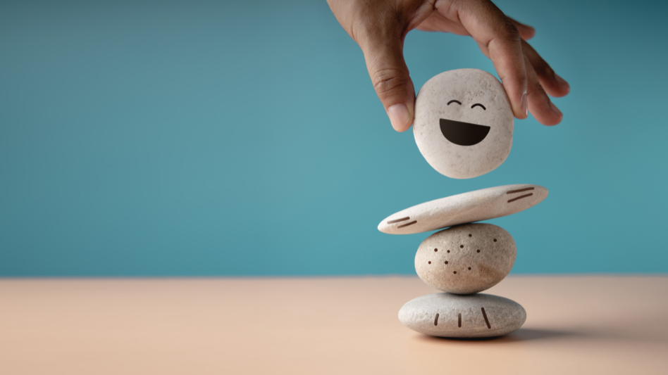 A stone with a smiley face on it