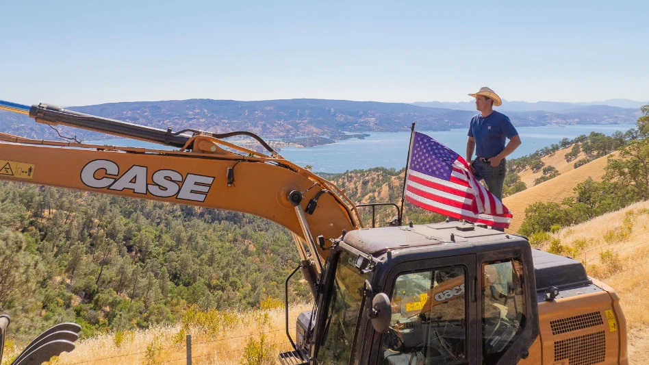 Jon Pardi in front of a CASE machine